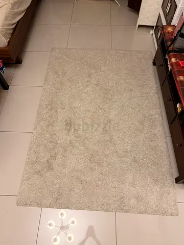 Light grey plush area rug - good condition