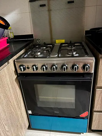 Used Midea 4-Burner Gas Cooker with Oven - Good Working Condition