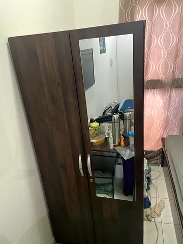 Two door dark wood wardrobe with mirror