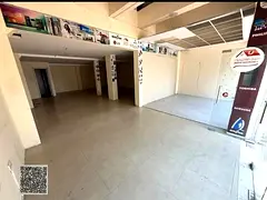 Lowest price for a shop for annual rent in Ajman, Al Rashidiya area