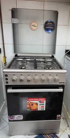 Moving Out Sale: Used Geepas 4-Burner Gas Stove with Oven — Good Working Condition
