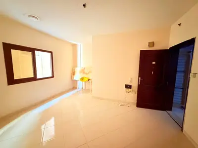LIMITED OFFER WITH CENTRAL AC AND CENTRAL GAS BIG SEPARATE KITCHEN IN JUST 18000 AED