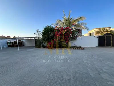 Villa in Rawda 2, 10,000 sq ft, strategically located near Sheikh Ammar Street, price includes electricity, water, and air conditioning.