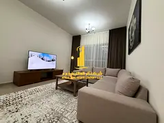 Two-bedroom apartment with a living room in Ajman - Corniche - Al Fazan Tower - furnished with hotel