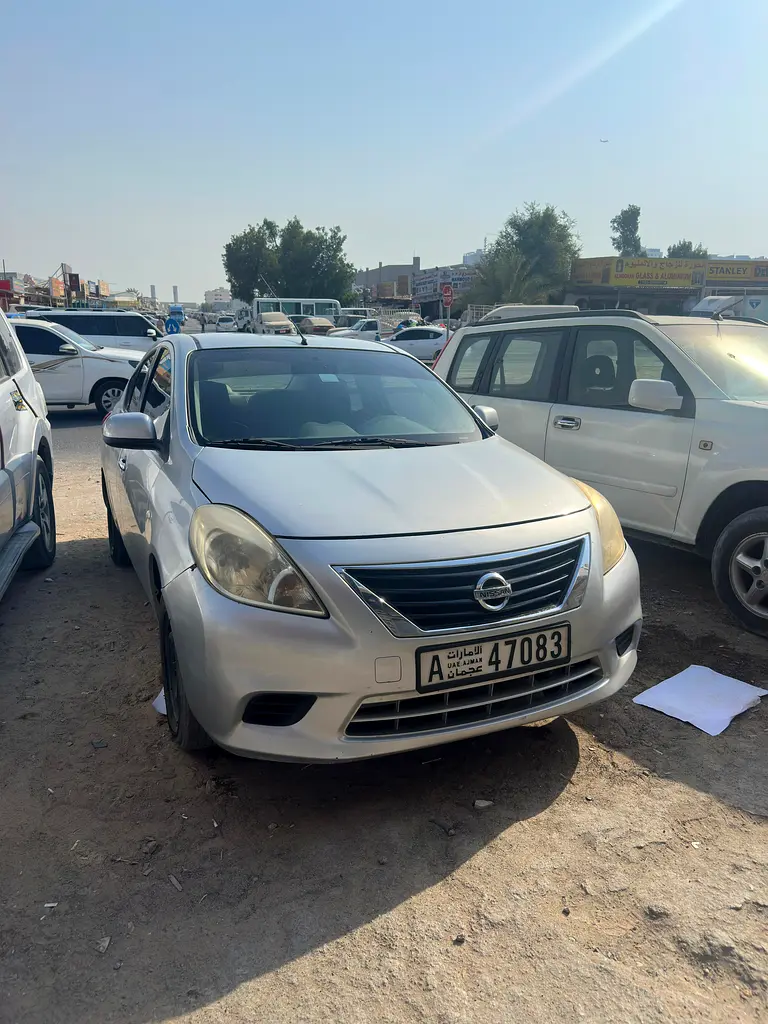 Nissan Sunny 2013 — photo 1 of 11