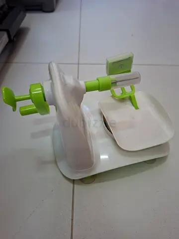 Used baby suction plate and feeder set — green/white
