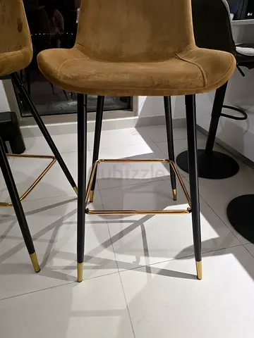 Set of 2 bar stools with velvet upholstery and gold-detail legs
