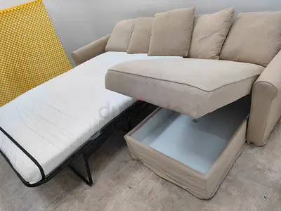 Ikea beige color lshape sofabed with storage