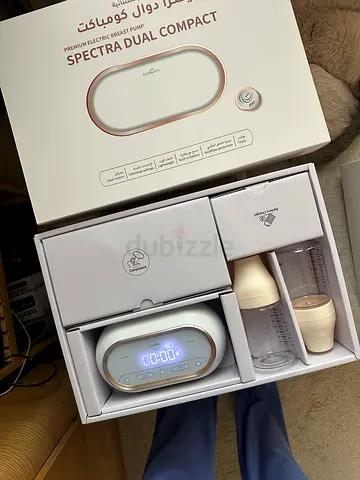 Spectra dual Compact Electric Breast Pump with Bottles - condition excellent
