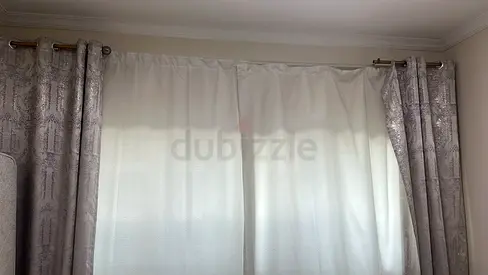 Full set of beige patterned curtains with white sheer lining - good condition