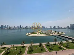 Seaview 2bhk with 2 Balcony Wardrobe Master Bedroom Laundry room with Parking in Al Majaz 3 Area