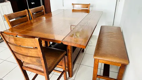 Wooden strong dining table with storage space with 4 chairs and a bench