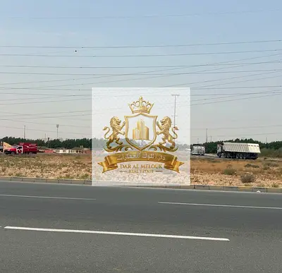 Land for sale in Emirates Industrial City – Al Sajaa Al Hanoo | Corner plot on Emirates Bypass Road and a 97-meter street | Freehold for Arabs
