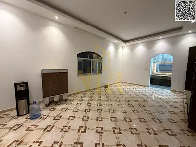 Luxury villa on the main street in Al Muwaihat 1, two floors and a roof, in an exceptional location with all services included.