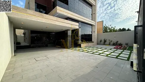 Luxury villa for sale in Rawda 3 | Land area 5000 sq ft, built-up area 5500 sq ft | Two floors + roof | 5 master bedrooms | Majlis, 2 living rooms + d