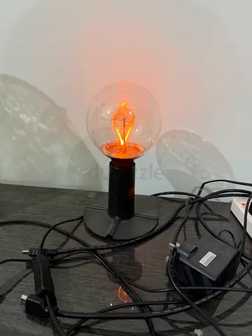 Small black table lamp with filament bulb (used)