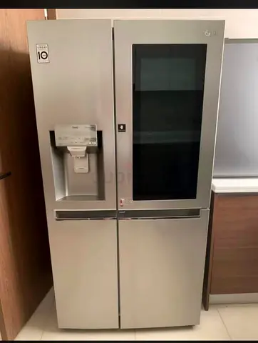 LG instaview side by side refrigerator with water dispancer