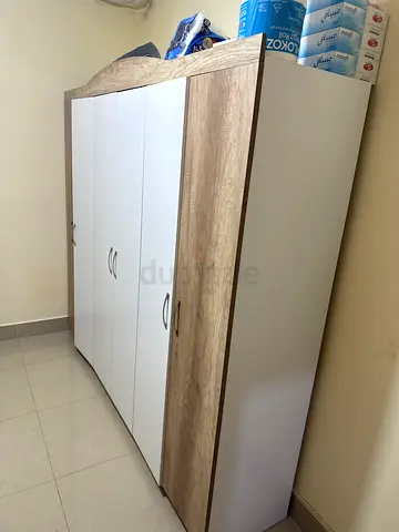 Wooden wardrobe with white doors - 4-door storage cabinet