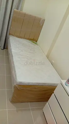 Single bed with mattress in excellent unused condition