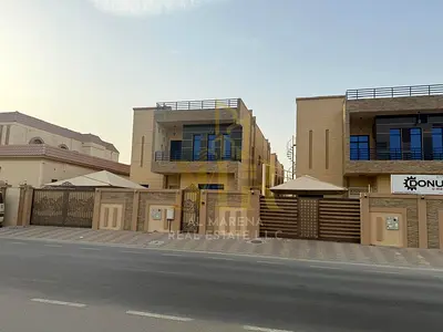 With an all-inclusive price for electricity, water, and air conditioning, own a luxurious villa for sale in Al Rawda 3 - Ajman | 5 master bedrooms | 5