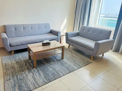 Light grey 3-seater and 2-seater sofa set with coffee table slightly used in good condition