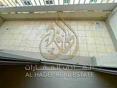 1BR apartment in Al Bu Tina with hall, balcony, central AC & gas, near all services, garbage room, d
