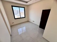 Two bedrooms and a new living room, first occupant in Al Jurf 3, Ajman. Natural light and an open vi