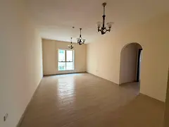 Two-bedroom apartment for annual rent in New Muwaileh | 3 bathrooms | Built-in wardrobes | Free park