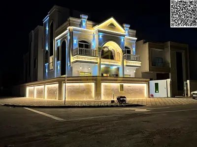 Abu Mido Corner Villa for sale in Al Helio 2, Ajman | 3,500 sq ft | Two floors + roof | 5 master bedrooms | Luxurious design and high-end finishes | R