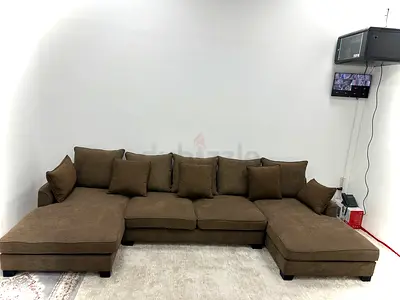 Looks great condition the one brand Ushape sofa