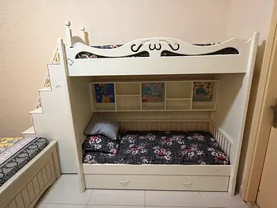 White wooden bunk bed with storage drawers and ladder - good condition