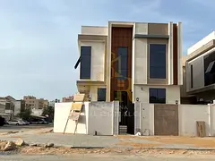 Villa in Al Rawda 1, corner plot on two streets, central air conditioning, 5 master bedrooms, opposi