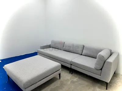 Brand new condition west elm sofa with footstool