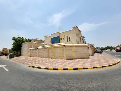 Luxury villa for sale in Al Muwaihat 2, Ajman, corner plot on two streets and an alley | Strategic location | High-end finishing | Price includes elec
