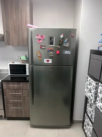 Used double-door refrigerator in excellent condition