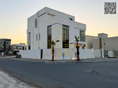 Own a corner villa with luxurious finishes in Al Zahia, Ajman | 7 master bedrooms and elevator | Price includes electricity, water, and air conditioni