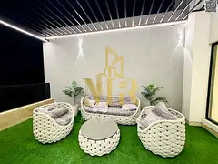 Luxury two-story villa with a rooftop terrace, located behind the Saudi German Hospital and near a s