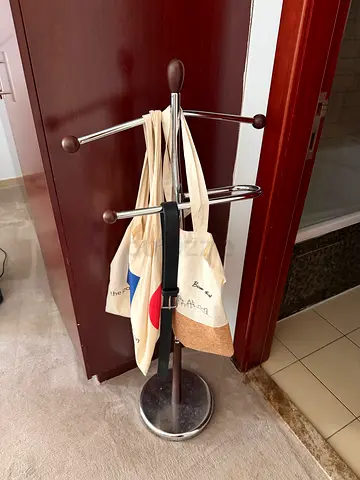 Free-standing coat and umbrella stand, stainless steel with wooden knobs