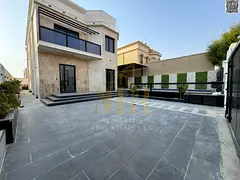 Al Muwaihat 2 villa with a swimming pool, priced inclusive of electricity, water, and air conditioni