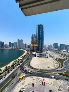 English Title: Luxury 2 Bedroom Apartment with Balcony, Sea View, Free AC and Free Parking in Al Kha