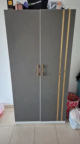 Grey 2-door Wardrobe with Gold Accent - Good Condition