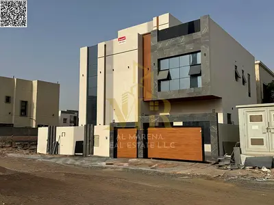 Freehold villa in one of Ajman's most prestigious areas, on a main street, price including registration fees.