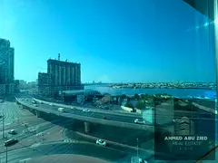 A spacious 3-bedroom apartment with a living room, stunning sea views, and a maid's room in Al K