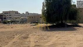 A plot of land with street and alley access is for sale directly opposite the mosque. Freehold owner
