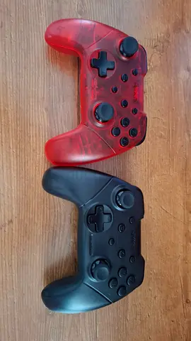 Pair of Nintendo Switch Pro-style Wireless Controllers (Red Transparent + Black)