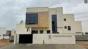 Villa for sale in Ajman, Al Yasmin area. Two floors and a roof terrace. 7 master bedrooms. Price inc
