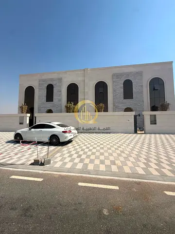 للبيع فليتين متلاصقات في المزيرعه باماره الشارقة موقع مميز