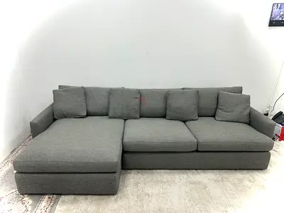 As perfect condition cratebarrel lshape sofa