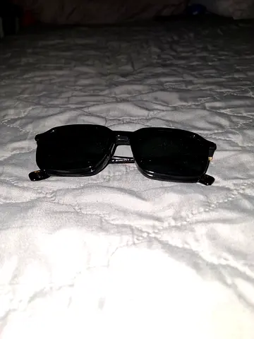 Black Police branded rectangular sunglasses clip on.