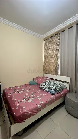 Double coat white wooden bed frame with mattress — good condition